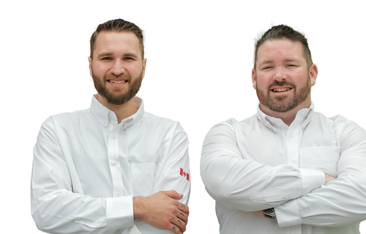 Two Furnace Guys technicians smiling in front of their green service van, wearing issued jackets during an on-site consultation.
